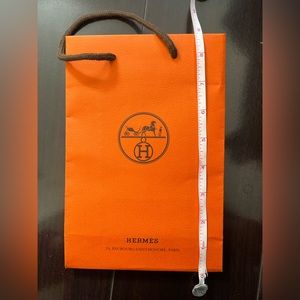 Authentic Hermes paper bag approx dimension 9’ x 6’ x 2.5’